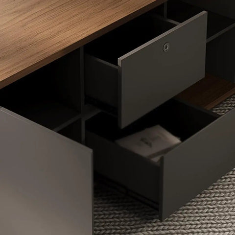 Close-up of Boss Mode Executive Computer Desk For Home Office showing drawers with a walnut top and gray finish, ideal for organizing.