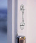 Hook and Eye Latch for Gate Cabinet Door Window Stainless Steel Lock installed on a door with a sleek stainless steel finish.