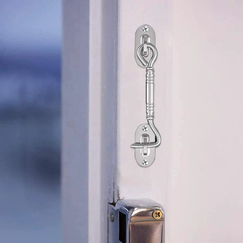 Hook and Eye Latch for Gate Cabinet Door Window Stainless Steel Lock installed on a door with a sleek stainless steel finish.