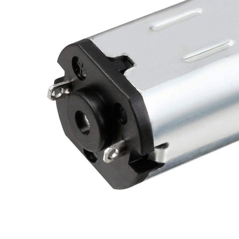 Close-up of GA12 N20 Micro DC 6V 200 RPM High Speed Reduction Motor With Mini Metal Gear Box And Two Terminals, showing motor connections
