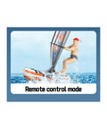 RC Sailboard Surfing Boat With Animated Surfer, 2.4G Remote Control on water, showing never-flip design and yellow accents