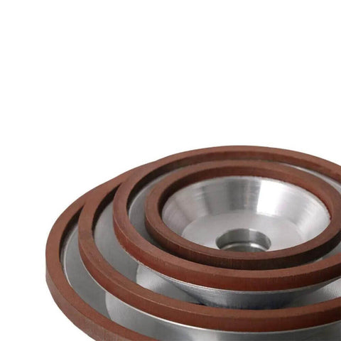 Close-up of resin bond diamond grinding wheel for carbide metal tungsten steel milling cutter, multiple sizes stacked