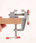 Dope Versatile Aluminum Alloy Vise For Desktop Or Handheld Use Adjustable Jewelry And Electronics Workstation Clamp Tabletop Ready Multi Function Metal Fixture For Crafting Repairs And Precise Holders, aluminum alloy clamp holding wood block