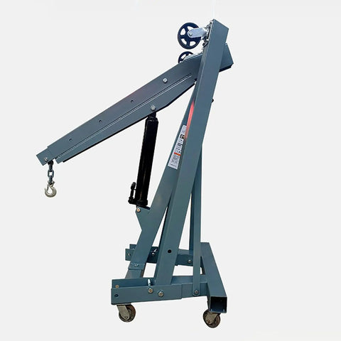 Heavy Duty Hydraulic Engine Hoist Folding Cherry Picker Shop Crane With Four Swivel Casters Rock Solid Steel Frame Adjustable Up To Two Ton side view with hydraulic arm and hook.