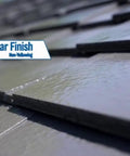 Close-up of a roof with a shiny, crystal clear finish showing the non-yellowing effect of Heavy Duty Tough As Nails Clear Roof Sealer Stops Leaks Cold For Seven Years While Delivering Waterproof Armor For Metal Copper Concrete Roofs And Skylights In A Real Deal Five Gallon Size.