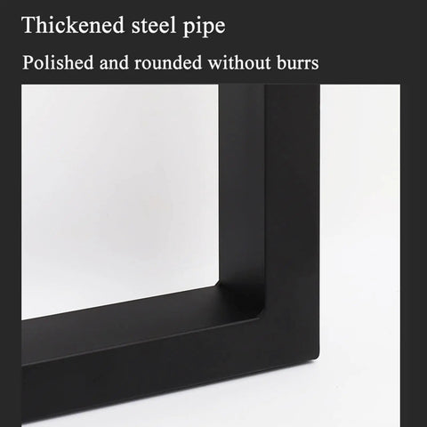 Close-up of thickened steel pipe, showcasing a polished edge and matte black finish, part of heavy duty modern metal table legs.