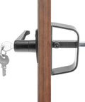 Top Notch 5 1/2 Inch Shed Door Lock L Handle Kit With Two Keys shown installed on a wooden door with a key.