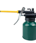 Side view of green metal oil pump oiler with pistol-grip lever and long yellow 9-inch flexible spout