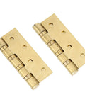 Rock Solid Heavy Gauge Stainless Steel Door Hinges With Hydraulic Buffering And Brushed Metal Hardware Built Tough For Dead Quiet And Butter Smooth Cabinet Swinging, flat brass finish, side view.