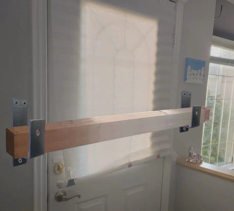 2x4 Door Barricade Brackets Build Rock Solid Security With A Sturdy U Shaped Metal Bar For Homes Garages Basements Sheds Warehouses And Backyards Keeps Doors Locked Down Against Break Ins showing wood beam on door barricade
