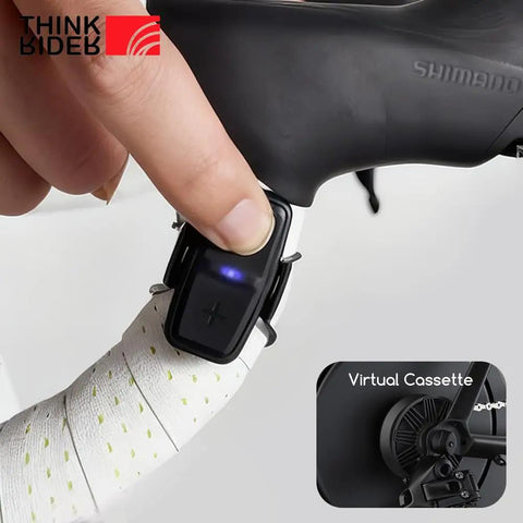 Close-up of Cycling BLE Controller With Virtual Transmission And Virtual Cassette For Bike Trainers X2Max XXPRO on handlebar.