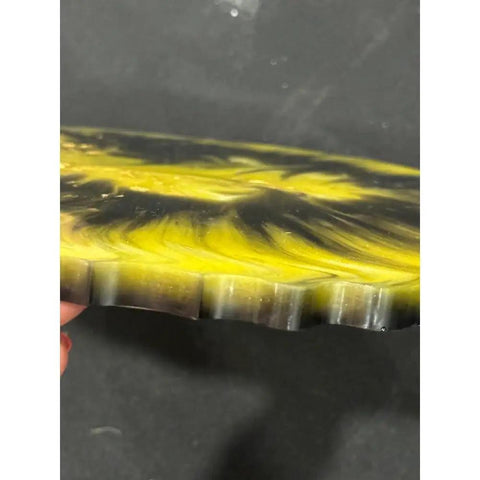 Yellow And Black Resin Lazy Susan With Gold Leaf Floral Centerpiece edge view showing color details