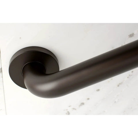 Meridian 12 Inch Solid Brass Grab Bar One And A Quarter Inch Diameter Polished Brass Bath Safety Rail installed on marble wall
