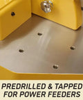 Rock Solid Shop Beast Five Horsepower Spindle Shaper With Massive Cast Iron Bed showing predrilled holes for power feeders.