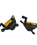 Front And Rear Post Mount Mechanical Disc Brake Set Including Matched Rotors In Classic Black Gold Finish showing detailed calipers.