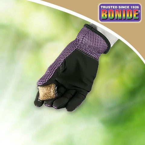 Gloved hand holding Mosquito Beater Water Soluble Pouch Pack Of 24 Kills Mosquito Larvae In Standing Water No Fuss Fish Safe