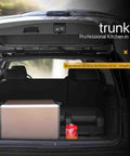 Open trunk showing compact Outdoor Mobile Kitchen For Camping And RV Trips Portable Stove And Cooking Station Quick Setup In Minutes