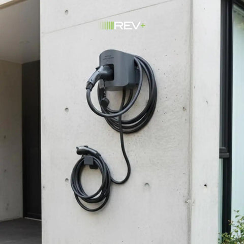 Dual Port Level 2 EV Charger With 50 Amps And 11.5 kW Power, 240V Smart Electric Vehicle Charger on outdoor wall