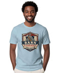 Classic Retro Mechanical Engineer Tee With Vintage Barn Garage Gear Badge Design For Hands-On Builders And Tool Loving Tinkerers In 100 Cotton, worn by a smiling man.