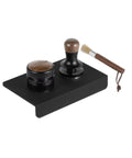 Pro Level Espresso Coffee Distributor And Tamper Set 58.35mm adjustable depth kit with wood handle and brush on black base.