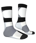 Upgrade Your Fit With Black And White Piano Grid Print Socks For Men And Women Moisture Wicking Polyester Crew Socks showcasing a geometric design.