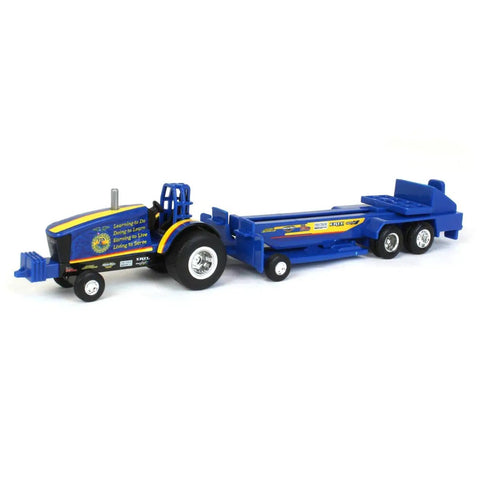 One Sixty Four Scale FFA Die Cast Pulling Tractor With Sled Nine Inch Long Farm Toy For Ages 3 Plus Totally Great For Collectors And Backyard Pulling Fun showing blue die-cast tractor and sled combination