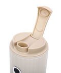 Portable Travel Coffee Maker With Built In Grinder 16 Oz Brew Cup top view showing lid and spout opening for easy drinking.