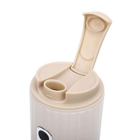 Portable Travel Coffee Maker With Built In Grinder 16 Oz Brew Cup top view showing lid and spout opening for easy drinking.