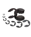 Get Those Shaft Parts Locked Down Tight With These Steel Circlips, E Clips And Retaining Rings In Assorted Sizes For Machinery Gear Fixing, assorted steel E clips laid out.