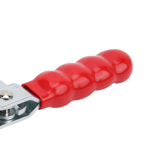 Red handle of a heavy duty welding toggle clamp for woodworking jigs and fixtures, featuring quick release and high strength metal build.