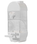 Bird Parent Approved House Shaped Automatic Bird Feeder And Water Dispenser For Parrots And Parakeets Clear design with white base.