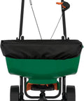 Broadcast Spreader Cover For Scotts Mini Fertilizer Spreaders, Black 600D Waterproof with Drawstring, fitted on green spreader.
