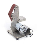 Hella Smooth Dual Bearing Mini Bench Belt Sander Including Ten Premium Sanding Belts For Polishing Grinding And Workshop Professional Tool Sharpening At Variable Speeds with stainless steel body and red sanding belt.