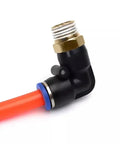 Close-up of an elbow fitting from the Pneumatic Air Connector Kit With Elbow Fittings And Quick Connect Hose For 4 6 8 10 12 Millimeter Lines Thread Sizes One Eighth One Quarter Three Eighths One Half Inch PL12 04, showing metal threads and orange hose.