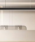 Top Shelf 4 Ft Linear Led Pendant Light With Smooth Remote Control Adjustable 3000K To 6000K Color Temperature above modern reception desk.