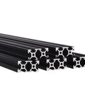 Five Pack 59 Inch V Slot 2040 Aluminum Extrusion Kit Black Anodized Linear Rail For 3D Printers And CNC DIY Projects Pro Grade European Standard 1500mm Length With Mounting Accessories. Black anodized 2040 V-slot aluminum extrusion profiles stacked on white.