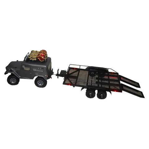 Heavy Duty Metal Trailer Cargo Carrier Kit For One Ten Scale RC Crawler Cars attached to a dark truck with gear on top.