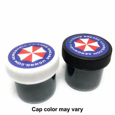 Pro Grade AeroShell 33MS And 64 Grease 1 Oz jars with white and black caps, heavy duty lubricant for hinges, gears, and more