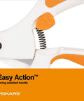 Premier No 8 Easy Action Scissors, close-up of spring-assisted handle with orange accents and titanium coating, ideal for crafts.