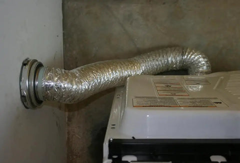 MV-Flex Magnetic Dryer Vent Coupling Anodized Silver For Flexible Installations, No-Fuss Path Around Tight Spaces, Fewer Elbows, Shorter Transitions, Boosted Airflow, Less Crushed Or Kinked Ducts, Quick Secure Drying Setup installed on dryer vent