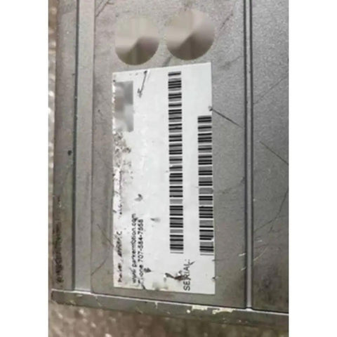 Used Compax-3 Servo Drive Controller For Industrial Automation, Rock-Solid Pre-Owned Servo Driver With Fast Install, High Performance Motion Control Unit For CNC Machines, Robotics, And Precision Equipment. metal servo drive label with barcode on gray industrial controller