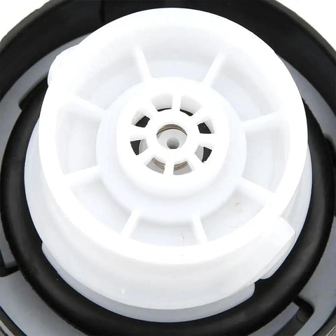 Reliable Gas Cap Replacement Fits 2000-2011 Nissan Cars And SUVs Including Altima, Sentra, Pathfinder, close-up of cap underside