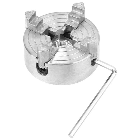 Heavy Duty 4 Jaw Independent Mini Lathe Chuck Forged From Premium Zinc Alloy with an adjustment key, showing four jaws.