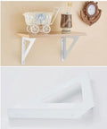 Top Notch Wrought Iron Corner Shelf Bracket Delivers Legit Heavy Duty Support For Wall Mounted Storage Systems And Rugged Diy Shelving Setups Across Any Home Or Workspace. White triangle bracket holds wooden shelf.