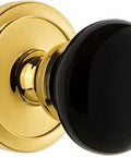 Circulaire Rosette With Coventry Knob Passage Set, Two And Three Quarters Inch Backset, Solid Forged Brass, Polished Brass Finish