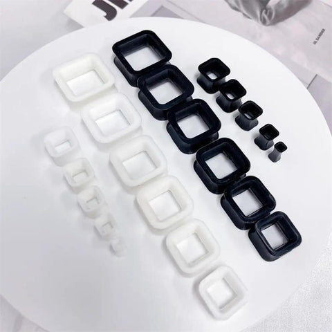 Rectangle Silicone Ear Tunnels And Plugs 00G 10MM Hollow Square Flexible Gauges Set in black and white on display