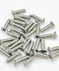 Grab a Badass 50 Pack of Number 4-40 X 1-3/4 Inch Flat Head Phillips Drive Machine Screws Crafted from Heavy Duty 304 Stainless Steel with Countersunk Heads for Rock Solid Construction and DIY Projects That Need Serious Hold Power - assorted screws on a white background.