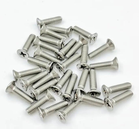 Grab a Badass 50 Pack of Number 4-40 X 1-3/4 Inch Flat Head Phillips Drive Machine Screws Crafted from Heavy Duty 304 Stainless Steel with Countersunk Heads for Rock Solid Construction and DIY Projects That Need Serious Hold Power - assorted screws on a white background.