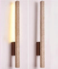 Linear Wall Sconce Wood Grain Strip Wall Light Slim Vertical Lamp Modern Minimalist Fixture with warm glow on wall.