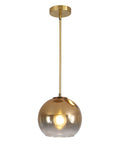 Gradient Gold Glass Pendant Light For Kitchen Island with round amber glass globe and brass rod.